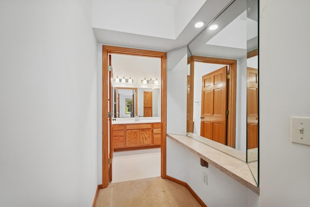 217 Canyon Dr, Hudson, WI 54016 - corridor with recessed lighting and light colored carpet