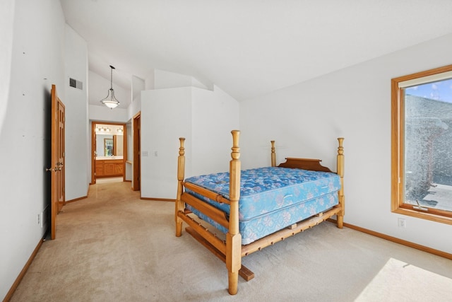 217 Canyon Dr, Hudson, WI 54016 - bedroom featuring light carpet, vaulted ceiling, and multiple windows