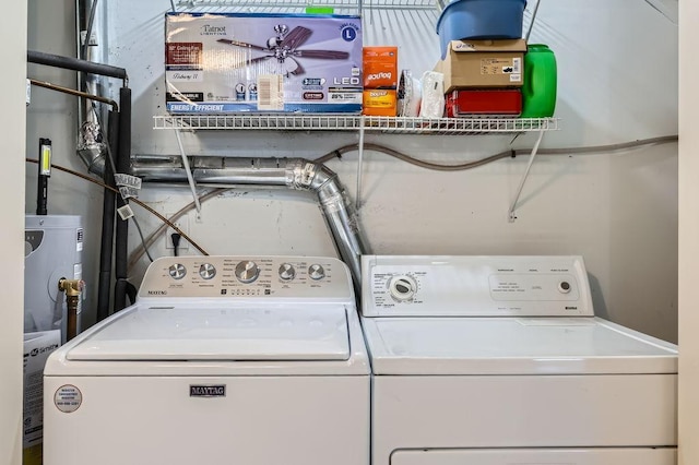 laundry room featuring washer and clothes dryer