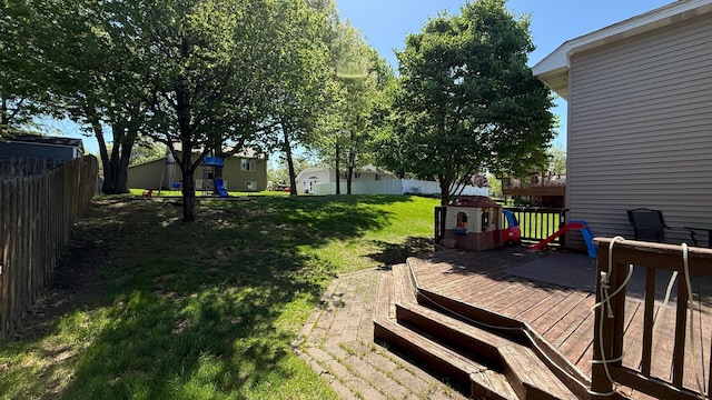 view of yard featuring a wooden deck