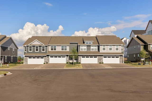 16386 Jaffna Pl, Lakeville, MN 55044 - view of property featuring stone siding and a residential view