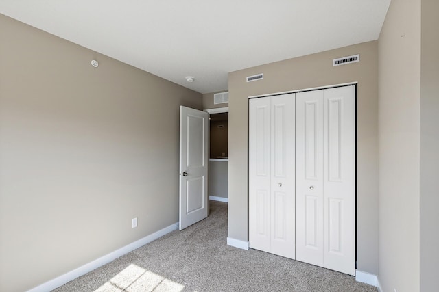 16386 Jaffna Pl, Lakeville, MN 55044 - unfurnished bedroom with carpet, baseboards, and a closet