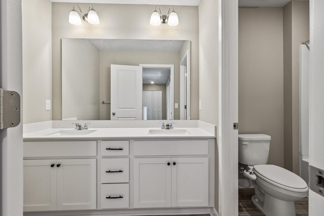 16386 Jaffna Pl, Lakeville, MN 55044 - bathroom featuring toilet and double vanity