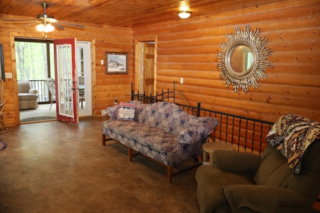 living room featuring ceiling fan, wooden ceiling, and log walls