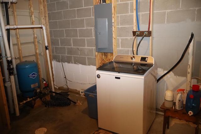 utility room featuring washer / clothes dryer and electric panel