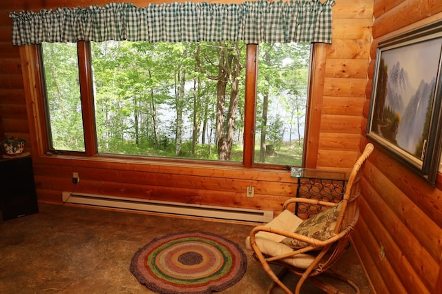 sunroom / solarium with baseboard heating and healthy amount of natural light