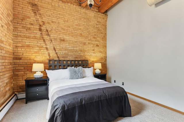 carpeted bedroom with a baseboard heating unit, brick wall, and baseboards