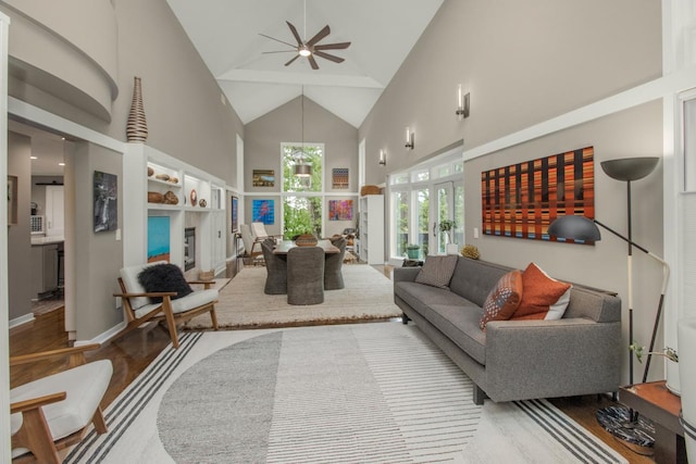 2 Edgcumbe Pl, Saint Paul, MN 55116 - living area featuring high vaulted ceiling, french doors, wood finished floors, a ceiling fan, and baseboards