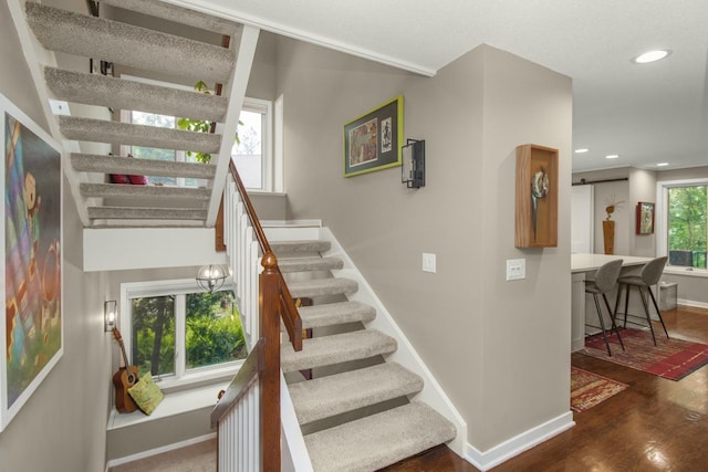 2 Edgcumbe Pl, Saint Paul, MN 55116 - stairway featuring baseboards, wood finished floors, and recessed lighting