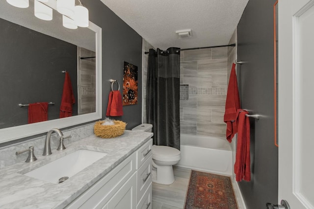 2 Edgcumbe Pl, Saint Paul, MN 55116 - full bath featuring vanity, shower / tub combo with curtain, toilet, and a textured ceiling