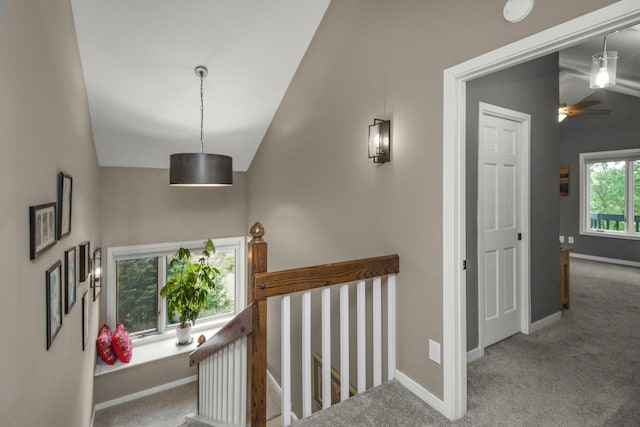 2 Edgcumbe Pl, Saint Paul, MN 55116 - corridor featuring an upstairs landing, carpet floors, vaulted ceiling, and baseboards