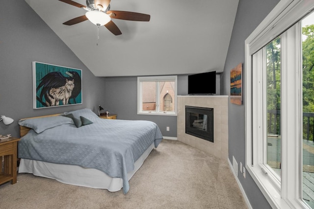 2 Edgcumbe Pl, Saint Paul, MN 55116 - bedroom with vaulted ceiling, carpet floors, a tile fireplace, baseboards, and a ceiling fan