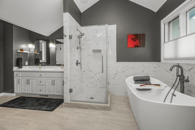 2 Edgcumbe Pl, Saint Paul, MN 55116 - bathroom featuring vaulted ceiling, a marble finish shower, double vanity, a soaking tub, and marble finish flooring