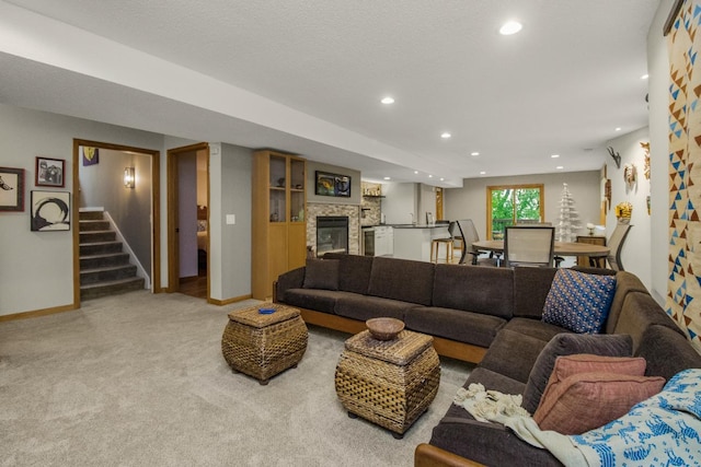 2 Edgcumbe Pl, Saint Paul, MN 55116 - living room featuring recessed lighting, stairway, carpet, a glass covered fireplace, and baseboards