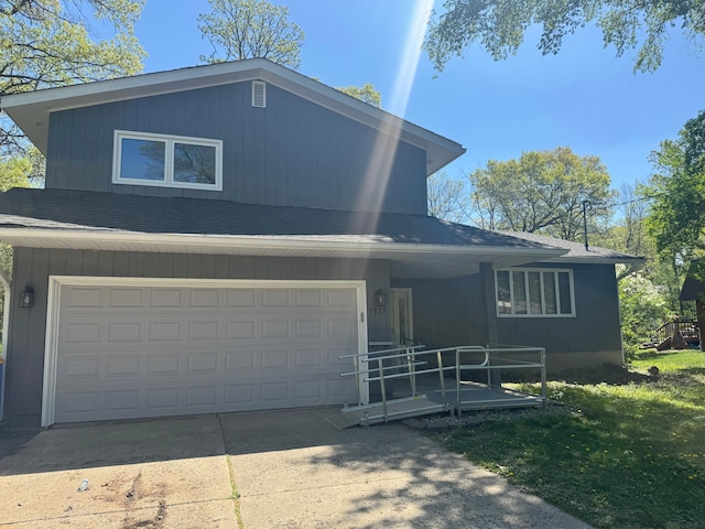 1725 Woodlawn Ave, Owatonna, MN 55060 - view of front of property with concrete driveway and roof with shingles