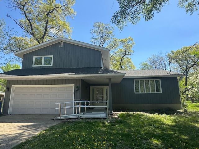 1725 Woodlawn Ave, Owatonna, MN 55060 - view of front of property with a shingled roof, concrete driveway, a front lawn, and a garage