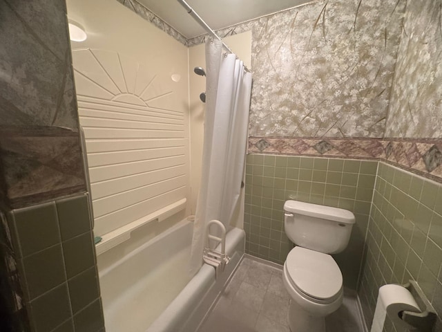 1725 Woodlawn Ave, Owatonna, MN 55060 - bathroom with tile walls, toilet, shower / tub combo with curtain, and tile patterned flooring