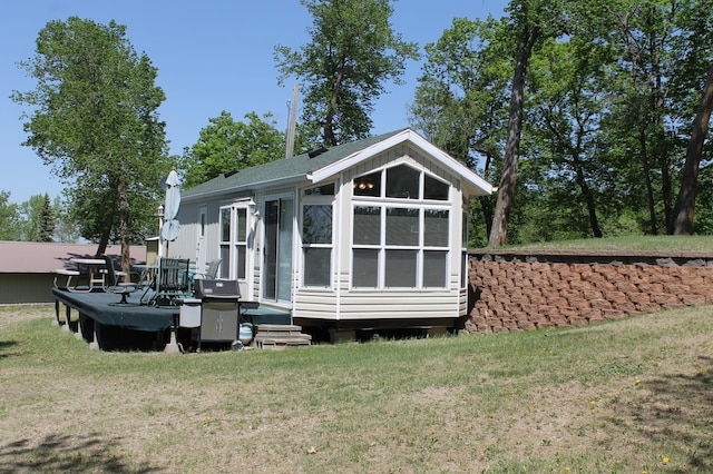 39624 Crane Lake Dr, Clitherall Twp, MN 56515 - view of side of home featuring a yard