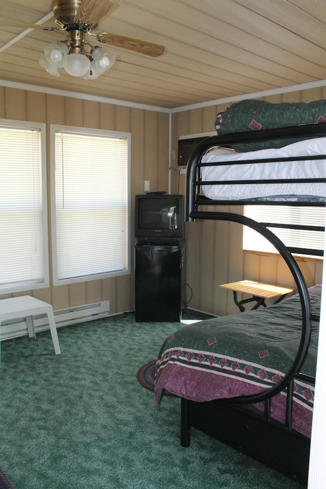 39624 Crane Lake Dr, Clitherall Twp, MN 56515 - bedroom featuring carpet, a baseboard radiator, and a ceiling fan