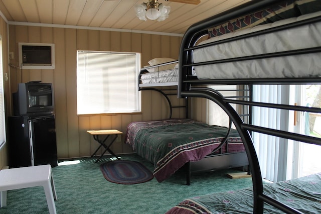 39624 Crane Lake Dr, Clitherall Twp, MN 56515 - carpeted bedroom with refrigerator, wood ceiling, an AC wall unit, and ornamental molding
