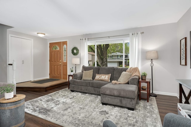 12037 Robin Rd, Maple Grove, MN 55369 - living room featuring baseboards and wood finished floors