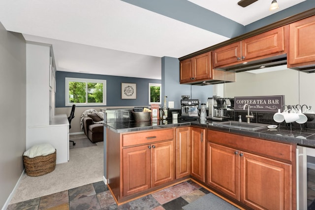 12037 Robin Rd, Maple Grove, MN 55369 - kitchen with a sink, beverage cooler, a peninsula, tile countertops, and brown cabinets