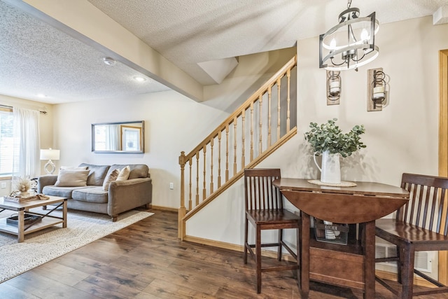 8289 Delaney Dr Unit 24, Inver Grove Heights, MN 55076 - living area with a textured ceiling, stairs, a chandelier, wood finished floors, and recessed lighting