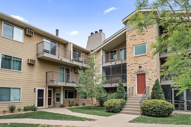 2250 Ridge Dr Unit 31, Saint Louis Park, MN 55416 - view of apartment building / complex with a wall mounted air conditioner