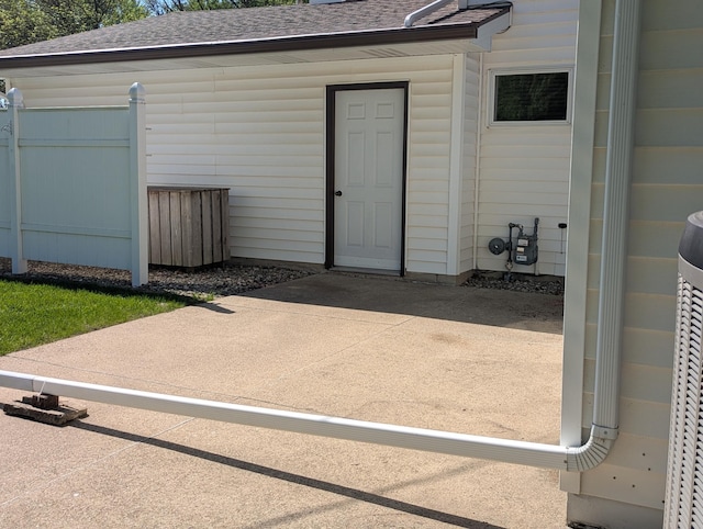 view of outdoor structure featuring fence