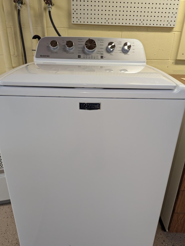 washroom featuring washer / dryer