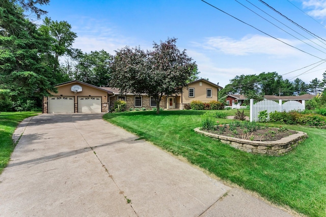 331 Sunset Ln N, Cambridge, MN 55008 - ranch-style house featuring a garage, driveway, a front yard, and stone siding