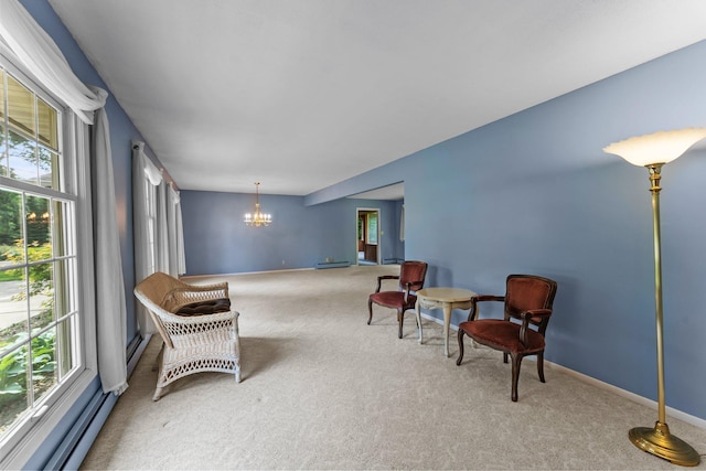331 Sunset Ln N, Cambridge, MN 55008 - sitting room featuring a chandelier, carpet, and plenty of natural light