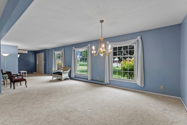 331 Sunset Ln N, Cambridge, MN 55008 - living area with a chandelier, carpet floors, and a baseboard heating unit