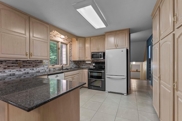 331 Sunset Ln N, Cambridge, MN 55008 - kitchen with stainless steel appliances, light brown cabinets, tasteful backsplash, a peninsula, and light tile patterned flooring