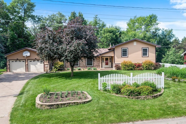 331 Sunset Ln N, Cambridge, MN 55008 - split level home with driveway, a garage, and an outdoor structure