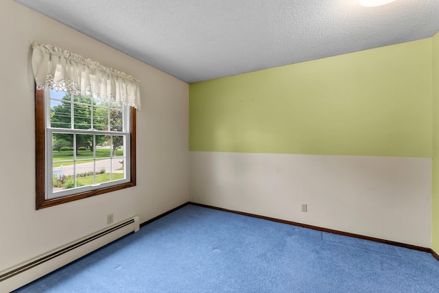 331 Sunset Ln N, Cambridge, MN 55008 - carpeted empty room featuring a baseboard radiator and a textured ceiling