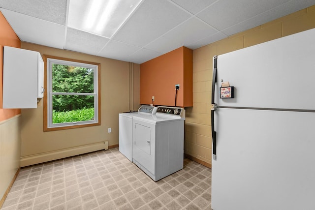 331 Sunset Ln N, Cambridge, MN 55008 - laundry area with washer and clothes dryer, a baseboard radiator, cabinet space, and light flooring