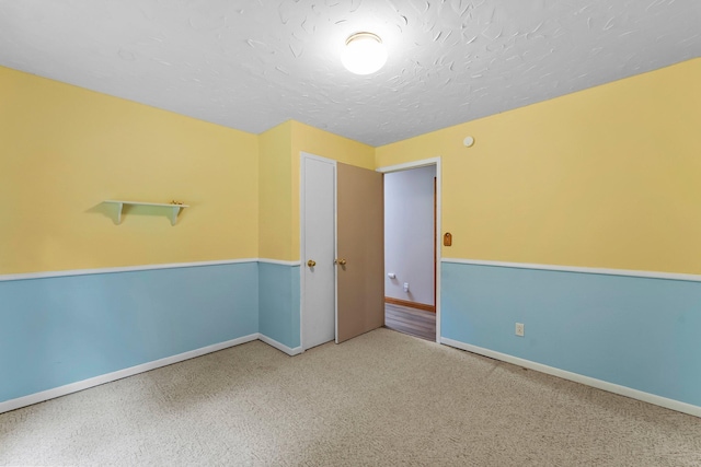 331 Sunset Ln N, Cambridge, MN 55008 - carpeted spare room with baseboards and a textured ceiling