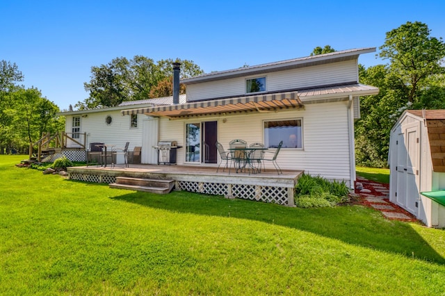 20473 Leisure Dr, Pelican Rapids, MN 56572 - back of property featuring a wooden deck, metal roof, and a yard