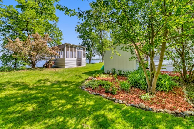 20473 Leisure Dr, Pelican Rapids, MN 56572 - view of green lawn featuring a sunroom