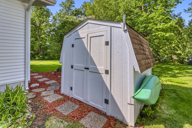 20473 Leisure Dr, Pelican Rapids, MN 56572 - view of shed featuring view of wooded area