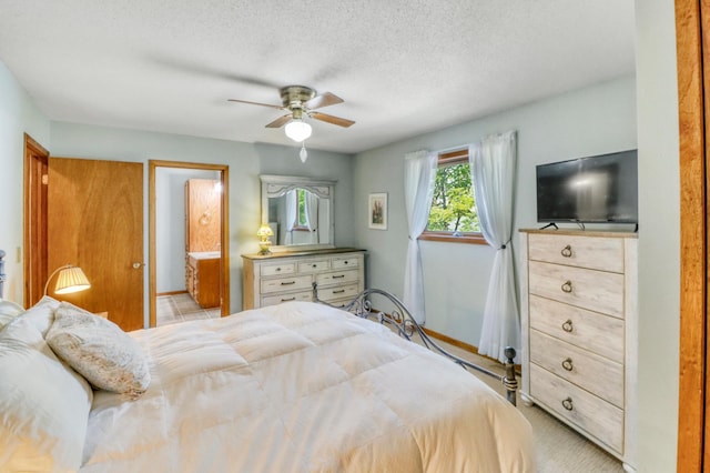 20473 Leisure Dr, Pelican Rapids, MN 56572 - bedroom with baseboards, a ceiling fan, a textured ceiling, and ensuite bathroom