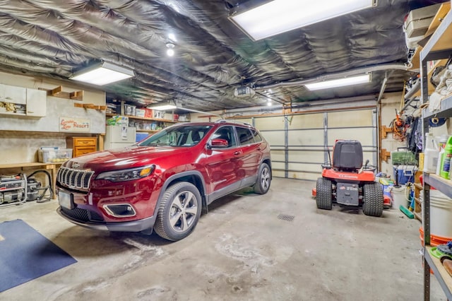 20473 Leisure Dr, Pelican Rapids, MN 56572 - garage featuring a garage door opener