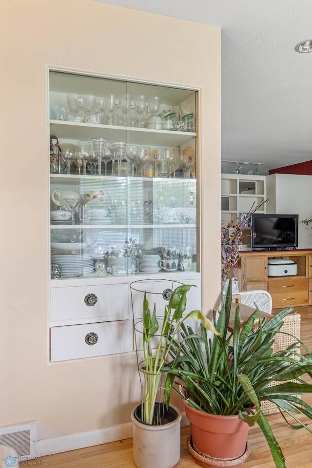 2020 5th St S, Moorhead, MN 56560 - bar featuring wood finished floors and baseboards