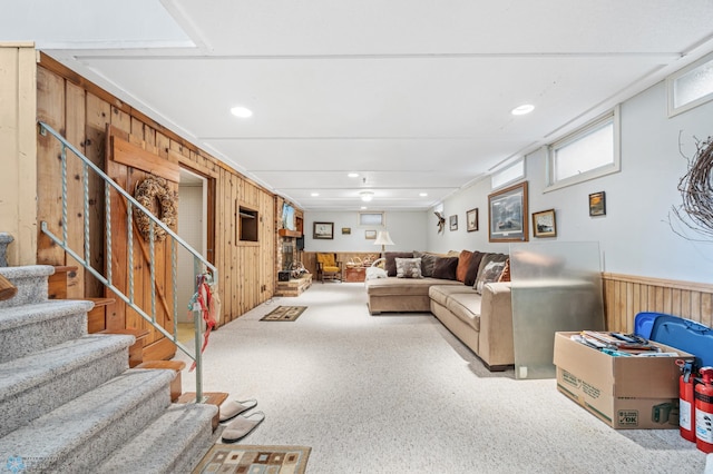 2020 5th St S, Moorhead, MN 56560 - living room with wooden walls, stairs, wainscoting, and recessed lighting