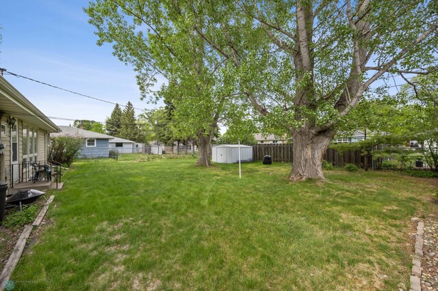 2020 5th St S, Moorhead, MN 56560 - view of yard with an outbuilding and a storage unit