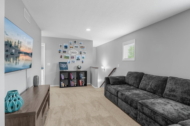 12266 Midway Cir NE, Blaine, MN 55449 - living room featuring light carpet, baseboards, and recessed lighting