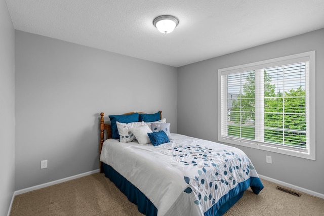12266 Midway Cir NE, Blaine, MN 55449 - bedroom with carpet flooring and baseboards