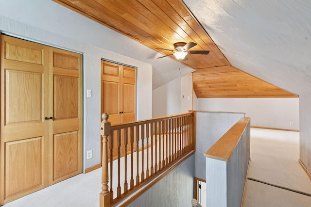 426 14th Ave N, Hopkins, MN 55343 - hall with an upstairs landing, carpet, lofted ceiling, wood ceiling, and baseboards