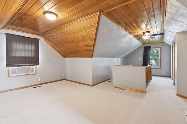 426 14th Ave N, Hopkins, MN 55343 - additional living space with carpet flooring, lofted ceiling, baseboards, cooling unit, and wooden ceiling